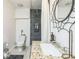 Bathroom with granite countertop vanity and stylish mirror at 266 Monarch Village Way, Stockbridge, GA 30281