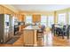 Bright kitchen featuring stainless steel appliances, granite countertops, and center island at 266 Monarch Village Way, Stockbridge, GA 30281