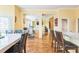 Spacious living area with hardwood floors, open to kitchen, dining, and office spaces at 266 Monarch Village Way, Stockbridge, GA 30281