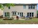 View of the rear exterior with a seating area at 3614 Clearbrooke Way, Duluth, GA 30097