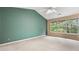 Spacious bedroom with neutral walls and large windows, offering lots of natural light and a calming atmosphere at 3614 Clearbrooke Way, Duluth, GA 30097