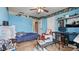 Bedroom with light-blue painted walls and a ceiling fan at 3614 Clearbrooke Way, Duluth, GA 30097