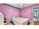 Bedroom with pink walls, a ceiling fan, and a bed at 3614 Clearbrooke Way, Duluth, GA 30097