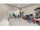 Large, carpeted room with an open layout and ample space for multiple uses at 3614 Clearbrooke Way, Duluth, GA 30097