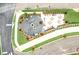 An aerial view of community green space featuring outdoor seating and a firepit for entertaining at 202 Dawson Dr, Woodstock, GA 30188