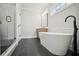 New bathroom featuring freestanding tub and separate shower at 202 Dawson Dr, Woodstock, GA 30188
