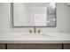 Bright bathroom showcasing a marble countertop and bronze hardware at 202 Dawson Dr, Woodstock, GA 30188