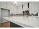Bright kitchen with marble countertops, gold faucet, and ample cabinet space at 202 Dawson Dr, Woodstock, GA 30188