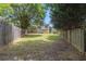Fenced backyard with ample green space, providing privacy and room for outdoor activities at 2175 Golden Valley Dr, Lawrenceville, GA 30043