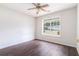 A bright bedroom with hardwood floors and a ceiling fan creates a clean, comfortable space at 2175 Golden Valley Dr, Lawrenceville, GA 30043