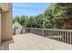 Lovely wooden deck area with views of mature trees, offering an inviting outdoor retreat at 2175 Golden Valley Dr, Lawrenceville, GA 30043