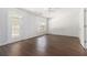 Spacious living room featuring hardwood floors, a door to the outside, and ample natural light at 2175 Golden Valley Dr, Lawrenceville, GA 30043