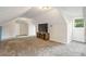 Open bonus room with neutral walls and plush carpet, perfect for various activities at 3488 Pebble Brook Ln, Stockbridge, GA 30281