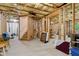 Partially finished basement with exposed framework, offering renovation potential and ample storage at 570 White Stag Ct, Suwanee, GA 30024