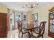 Formal dining room featuring a chandelier, bay window, and elegant furnishings at 570 White Stag Ct, Suwanee, GA 30024