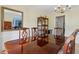 Formal dining room featuring a chandelier, bay window, and elegant furnishings at 570 White Stag Ct, Suwanee, GA 30024
