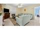 Relaxing living room with a fireplace and neutral decor at 570 White Stag Ct, Suwanee, GA 30024