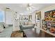Open living room with access to the kitchen and backyard at 570 White Stag Ct, Suwanee, GA 30024