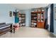 Bright living space with light blue walls, tile flooring, and filled with personal belongings at 570 White Stag Ct, Suwanee, GA 30024