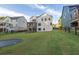 The large back yard features a trampoline, fencing, and plenty of room to play at 401 Pirkle Ave, Buford, GA 30518