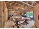 Unfinished basement featuring exposed beams and ductwork, and a rough-in for the plumbing at 401 Pirkle Ave, Buford, GA 30518