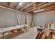 Unfinished basement with an unfinished cement wall, ready for your customization at 401 Pirkle Ave, Buford, GA 30518