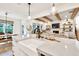 Kitchen island with a farmhouse sink overlooks the spacious living area at 401 Pirkle Ave, Buford, GA 30518