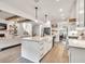 Spacious kitchen island featuring a farmhouse sink and seamless integration into the living space at 401 Pirkle Ave, Buford, GA 30518