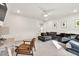 Cozy living area features a plush sectional sofa, modern decor, and natural light at 401 Pirkle Ave, Buford, GA 30518