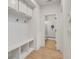 Well-organized mudroom with built-in bench, storage cubbies, and convenient access to a full bathroom at 401 Pirkle Ave, Buford, GA 30518