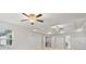 Large primary bedroom boasting tray ceiling, recessed lighting, and multiple windows at 2040 Bloomfield Ct, Cumming, GA 30041