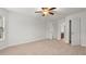 Spacious bedroom featuring carpet, and ceiling fan at 2040 Bloomfield Ct, Cumming, GA 30041