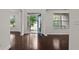 Elegant foyer with hardwood floors, natural light, and neutral paint colors at 2040 Bloomfield Ct, Cumming, GA 30041