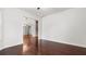 Open-concept living space with hardwood flooring and seamless flow throughout at 2040 Bloomfield Ct, Cumming, GA 30041