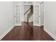 Elegant entryway features hardwood floors and stylish French doors to the hallway at 2040 Bloomfield Ct, Cumming, GA 30041