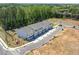 Aerial view of new townhomes with two car garages and professional landscaping at 2405 Malster Ln, Lawrenceville, GA 30043