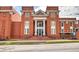 Exterior of Bobby Sikes building with brick facade and classic architectural details at 2405 Malster Ln, Lawrenceville, GA 30043