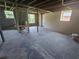 Spacious unfinished basement featuring natural light, offering potential for customization and expansion at 766 Longleaf Dr, Forest Park, GA 30297