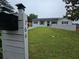 Charming home boasts manicured landscaping, a brick facade, and a welcoming entryway for curb appeal at 766 Longleaf Dr, Forest Park, GA 30297