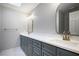 Bright bathroom featuring double vanity with stone countertops, and updated fixtures at 963 Bolingbrook Sw Dr, Marietta, GA 30064
