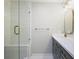 Updated bathroom featuring walk-in shower with glass door and modern vanity at 963 Bolingbrook Sw Dr, Marietta, GA 30064