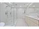 Modern bathroom featuring a glass-enclosed shower, double sinks and updated fixtures at 963 Bolingbrook Sw Dr, Marietta, GA 30064