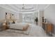 Bright bedroom featuring a trey ceiling, bay windows, neutral decor, and ample natural light at 963 Bolingbrook Sw Dr, Marietta, GA 30064