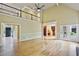 Bright living room with vaulted ceiling, hardwood floors, and views to an upper level walkway at 963 Bolingbrook Sw Dr, Marietta, GA 30064