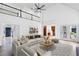 Bright living room with soaring ceilings, second story loft and a neutral color palette at 963 Bolingbrook Sw Dr, Marietta, GA 30064