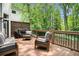 This back deck is perfect for outdoor entertaining and has lots of seating at 29 Greenland Trce, Atlanta, GA 30342