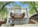 The exterior features a private deck perfect for entertaining, with convenient garage access and lush greenery at 29 Greenland Trce, Atlanta, GA 30342