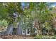 Charming blue-brick home features a cozy front entrance with a well-manicured yard and inviting walkway at 29 Greenland Trce, Atlanta, GA 30342