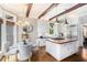 Well-appointed kitchen with a wood-topped island, white cabinets, and stainless steel appliances at 29 Greenland Trce, Atlanta, GA 30342
