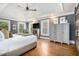 Spacious main bedroom with tray ceiling, multiple windows, and ample natural light at 29 Greenland Trce, Atlanta, GA 30342
